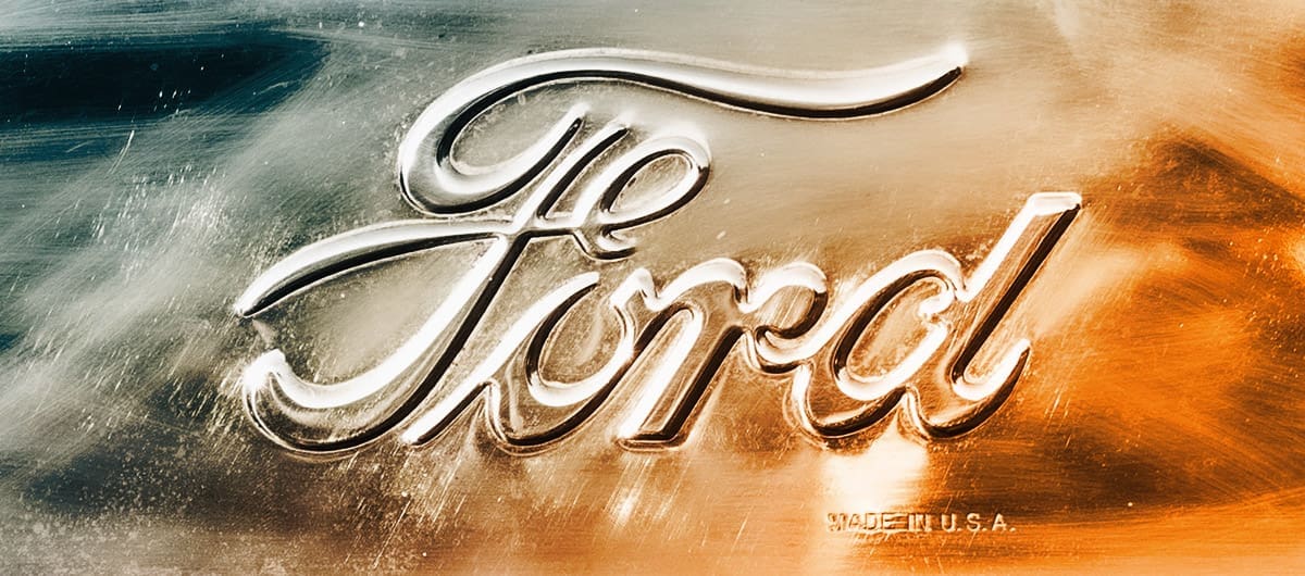 Raised engraving on shiny metal that reads "Ford"